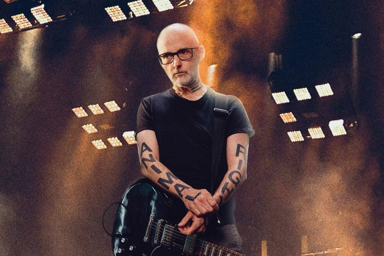 Moby performing on stage